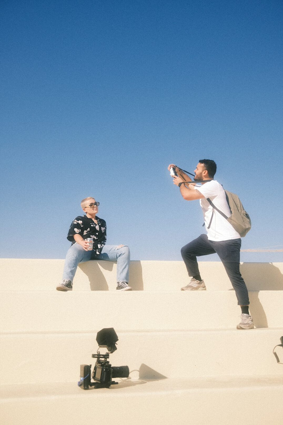 Journalist and camera operator preparing a video report